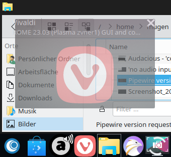 taskbar as it should be - Audacious, Vivaldi browser and Dolphin windows open